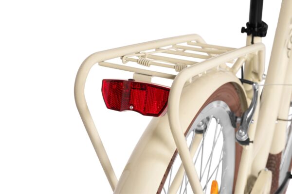 Cykelbagtaskeholder med baglygte på cremefarvet cykel